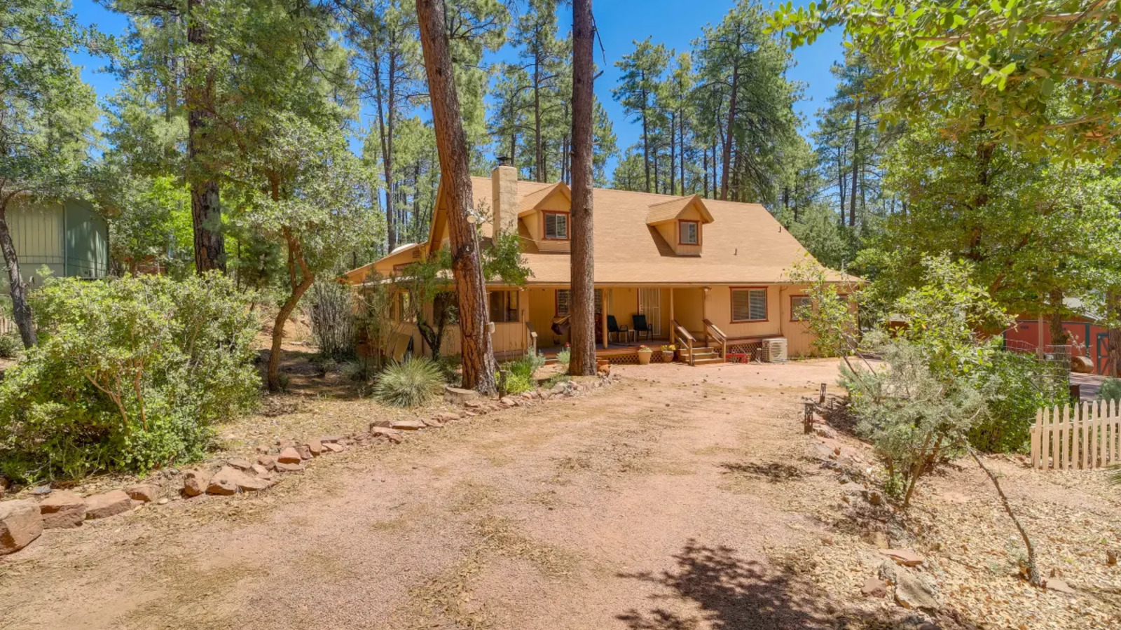 Exterior view of the cabin and deck from above.