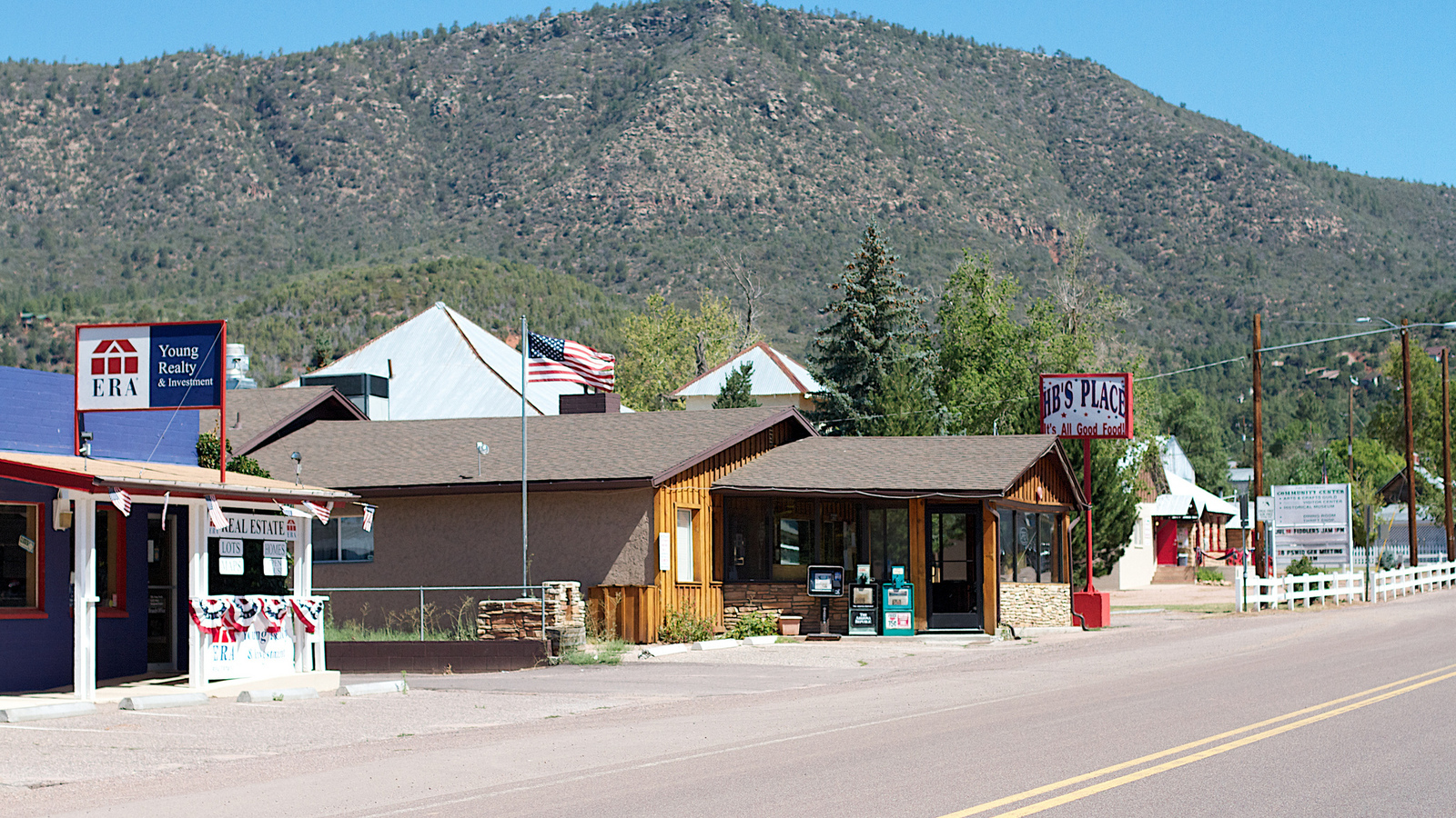 Aerial view of Pine, Arizona with mountains beyond.
